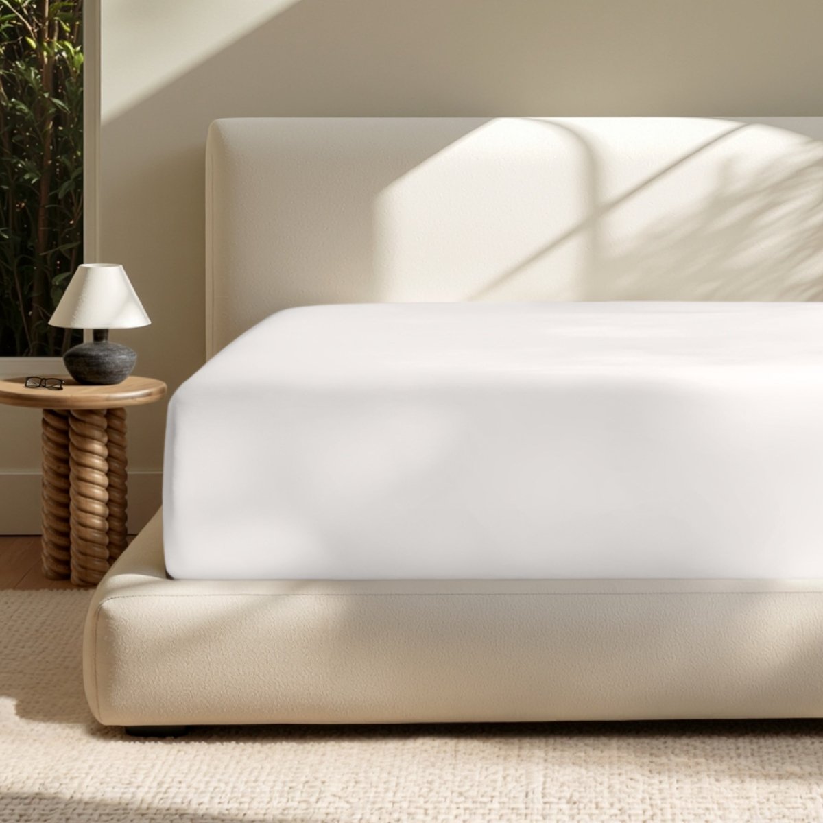 A deep pocket mattress with a fitted sheet on it