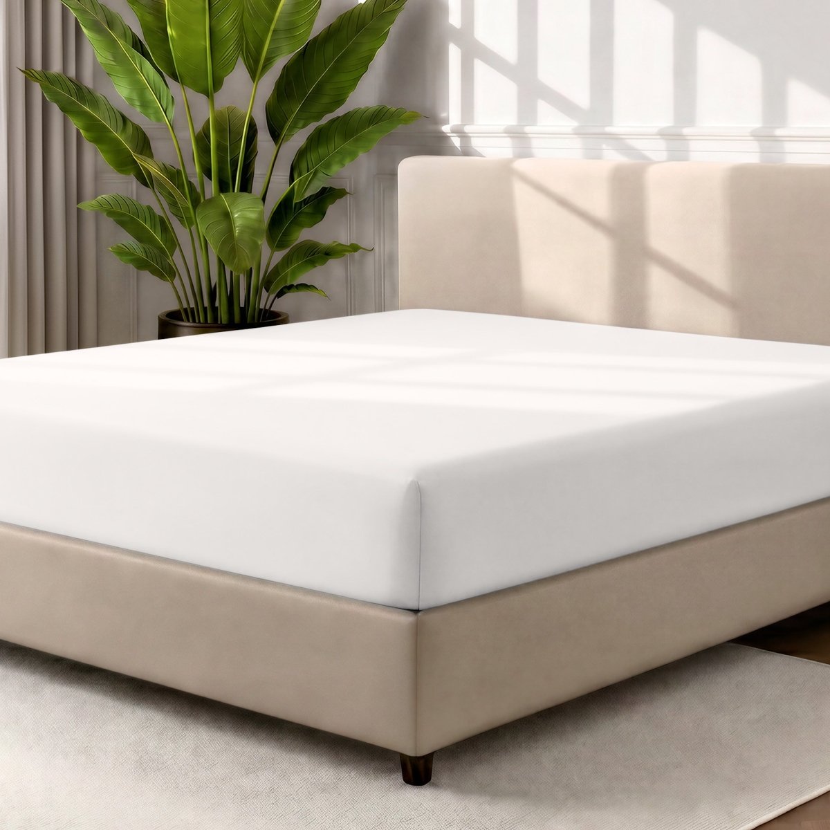 Ultra soft fitted sheet on a mattress with the sun shining into the bedroom