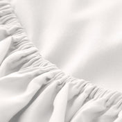 Close-up of fitted sheet with all around elastic