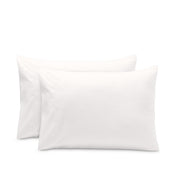 2 pillowcases on pillows