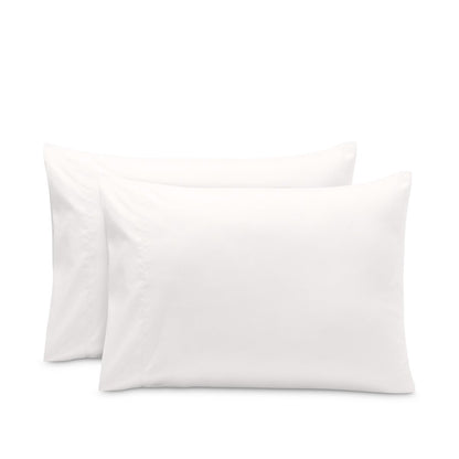 2 pillowcases on pillows