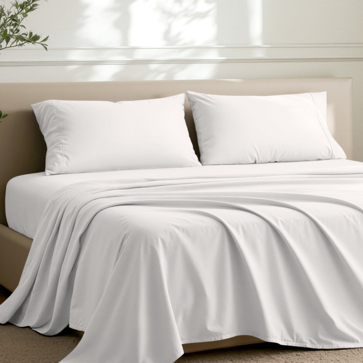 2 pillowcases on pillows on a nicely made bed