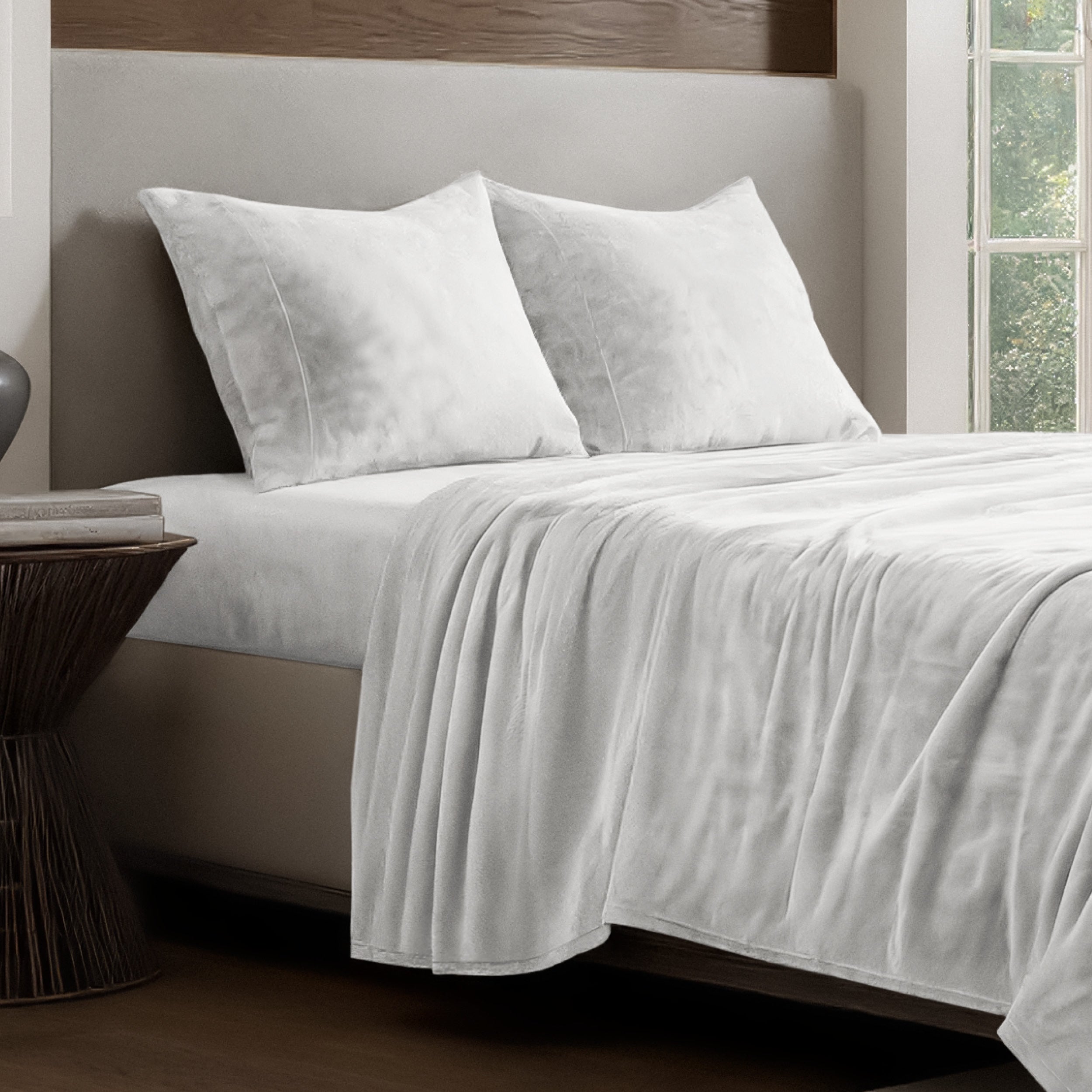 Microplush sheet set on a bed.