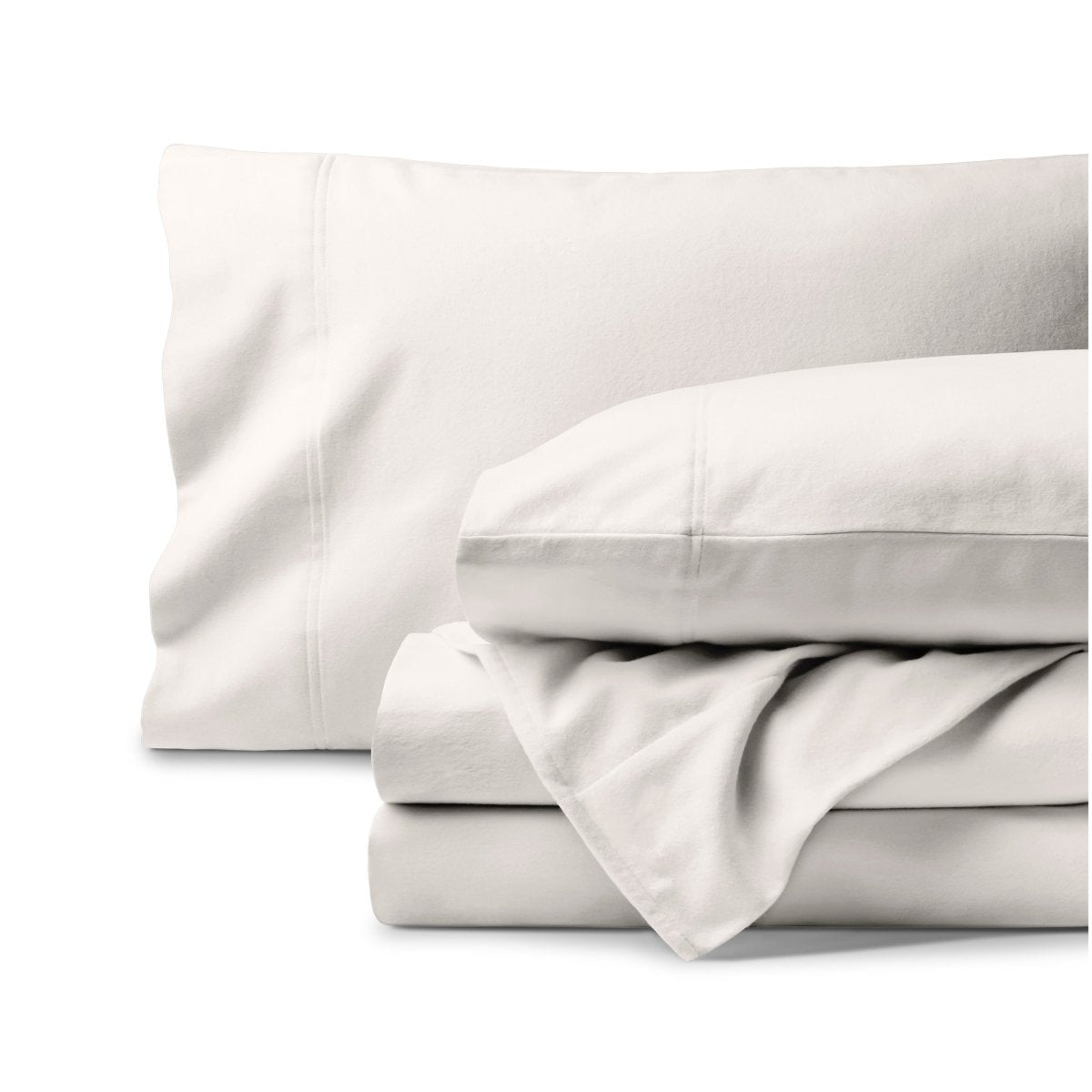 Organic flannel bed sheets and pillowcase set on a white background