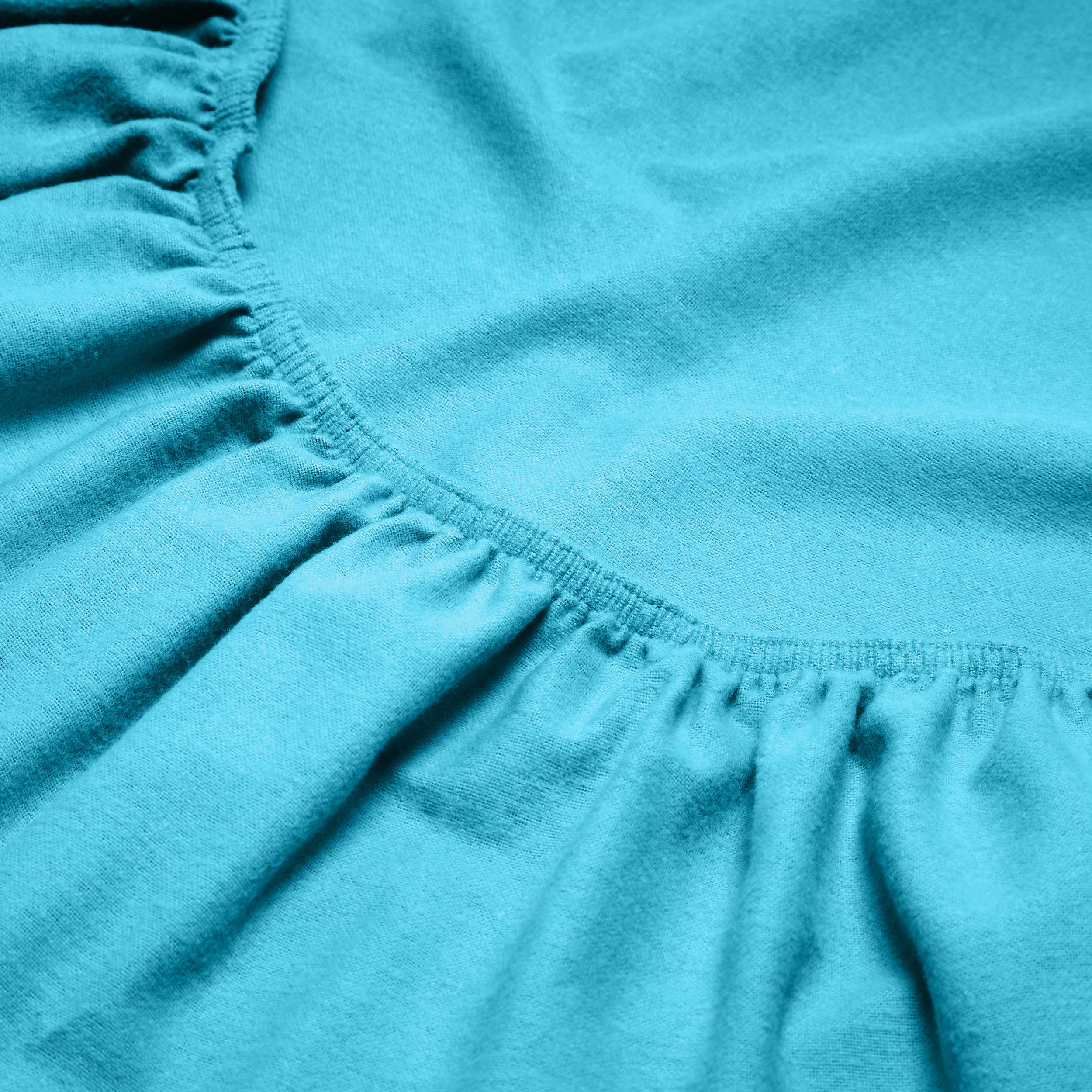 Close-up of a flannel fitted sheet with gathered elastic
