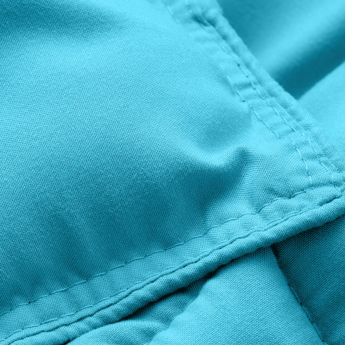 Close-up of comforter fabric with stitching detail