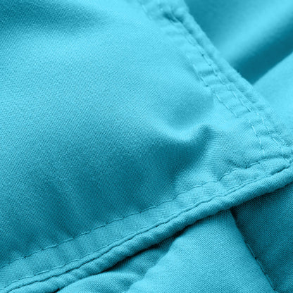 Close-up of comforter fabric with stitching detail