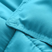 Close-up of comforter fabric with stitching detail