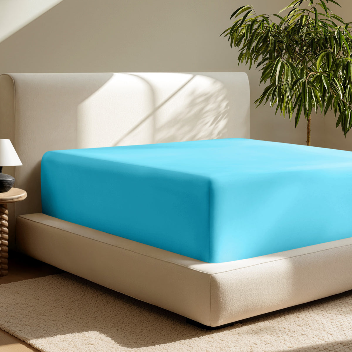 A deep pocket fitted sheet on a mattress