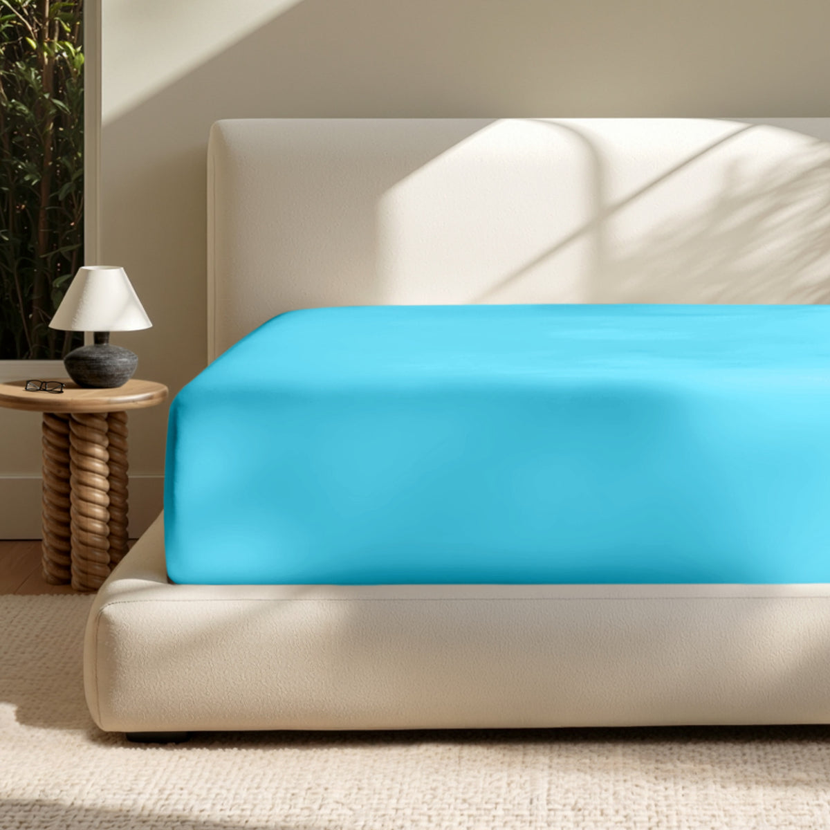 A deep pocket mattress with a fitted sheet on it