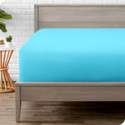 A fitted sheet on a mattress