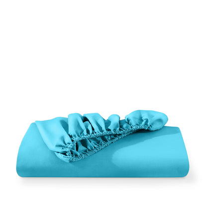 Microfiber fitted sheet folded with a white background
