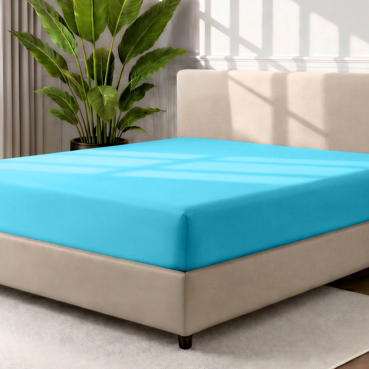 Ultra soft fitted sheet on a mattress with the sun shining into the bedroom