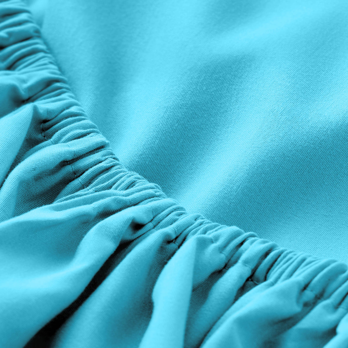 Close-up of fitted sheet with all around elastic