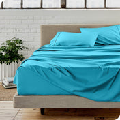 A modern bedroom with microfiber sheets on the mattress