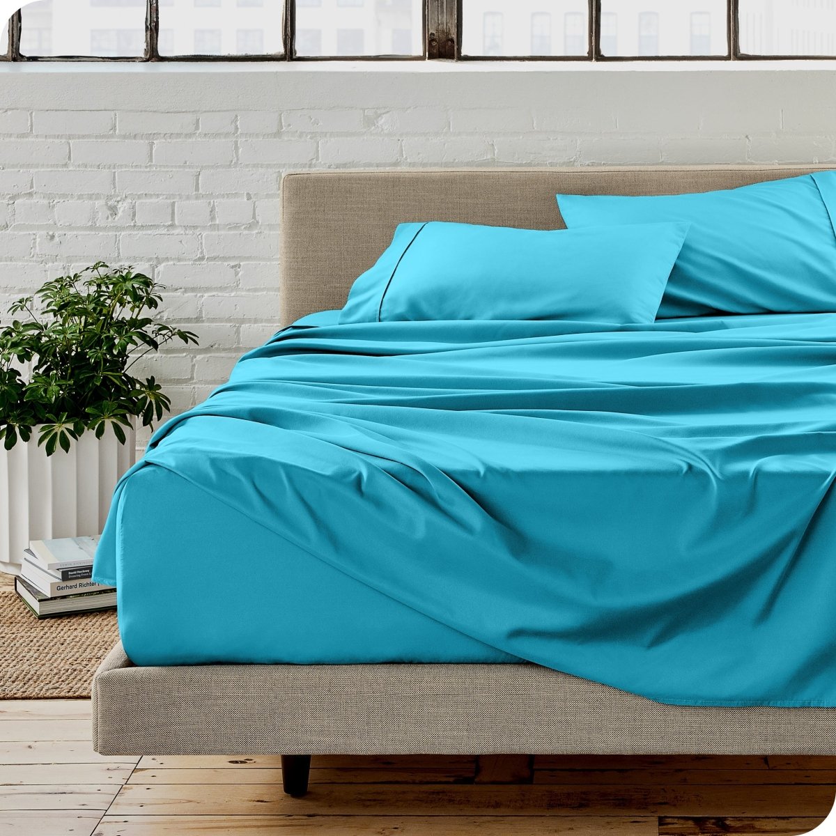 A modern bedroom with microfiber sheets on the mattress