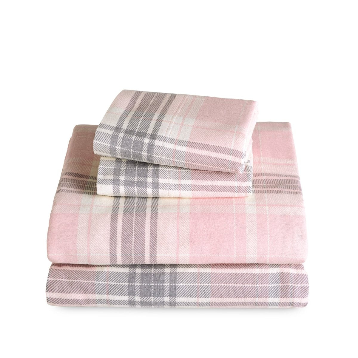Stack of flannel sheets and pillowcases on a white background