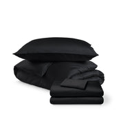 Bedding set including duvet set and sheet set on a white background