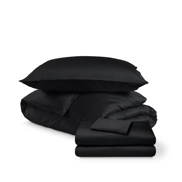 Bedding set including duvet set and sheet set on a white background