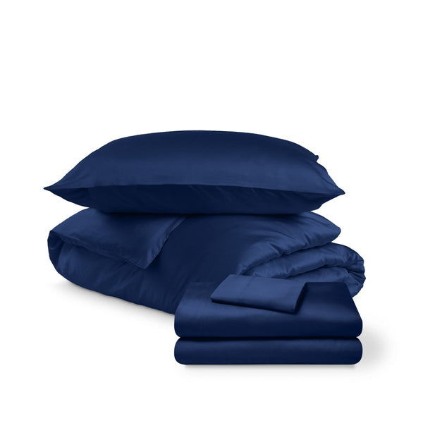Bedding set including duvet set and sheet set on a white background