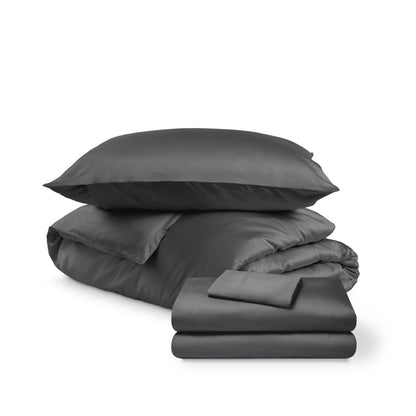 Bedding set including duvet set and sheet set on a white background