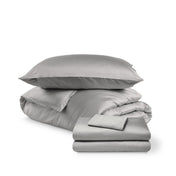 Bedding set including duvet set and sheet set on a white background