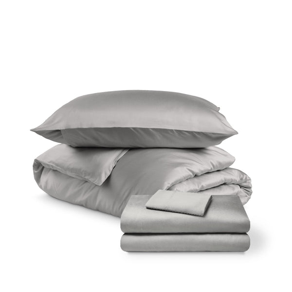 Bedding set including duvet set and sheet set on a white background