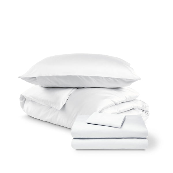 Bedding set including duvet set and sheet set on a white background