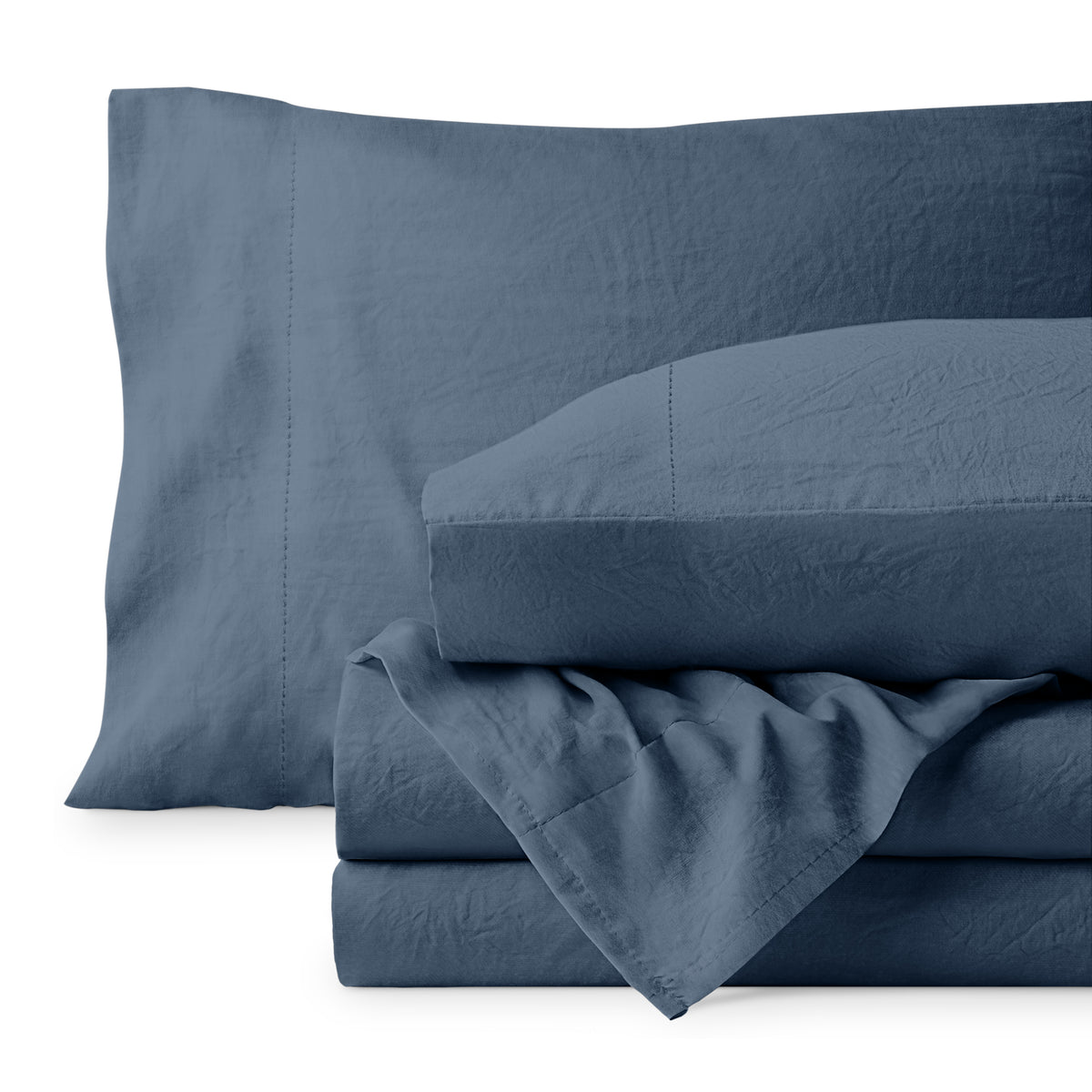 Washed microfiber sheet set folded and stacked on a white background