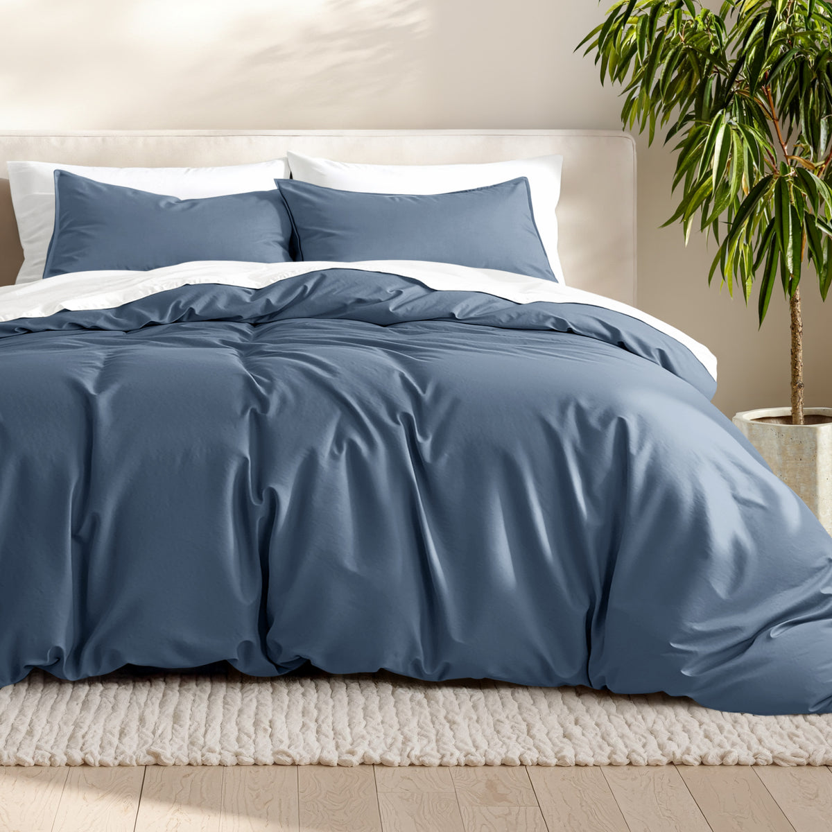 Microfiber bedding set on a bed with a neutral background