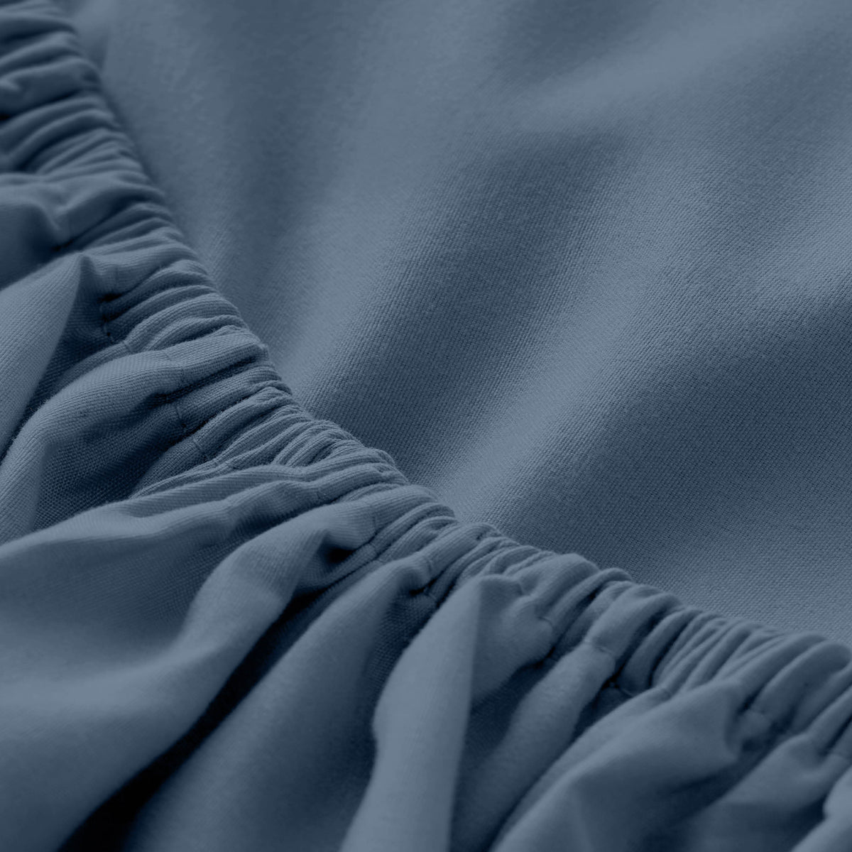 Close-up of fitted sheet with all around elastic