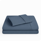 Microfiber sheet set folded and stacked neatly.