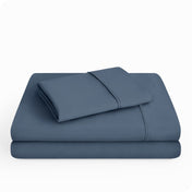 Microfiber sheet set folded and stacked neatly.