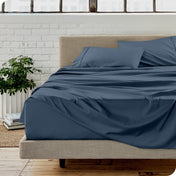 A modern bedroom with microfiber sheets on the mattress