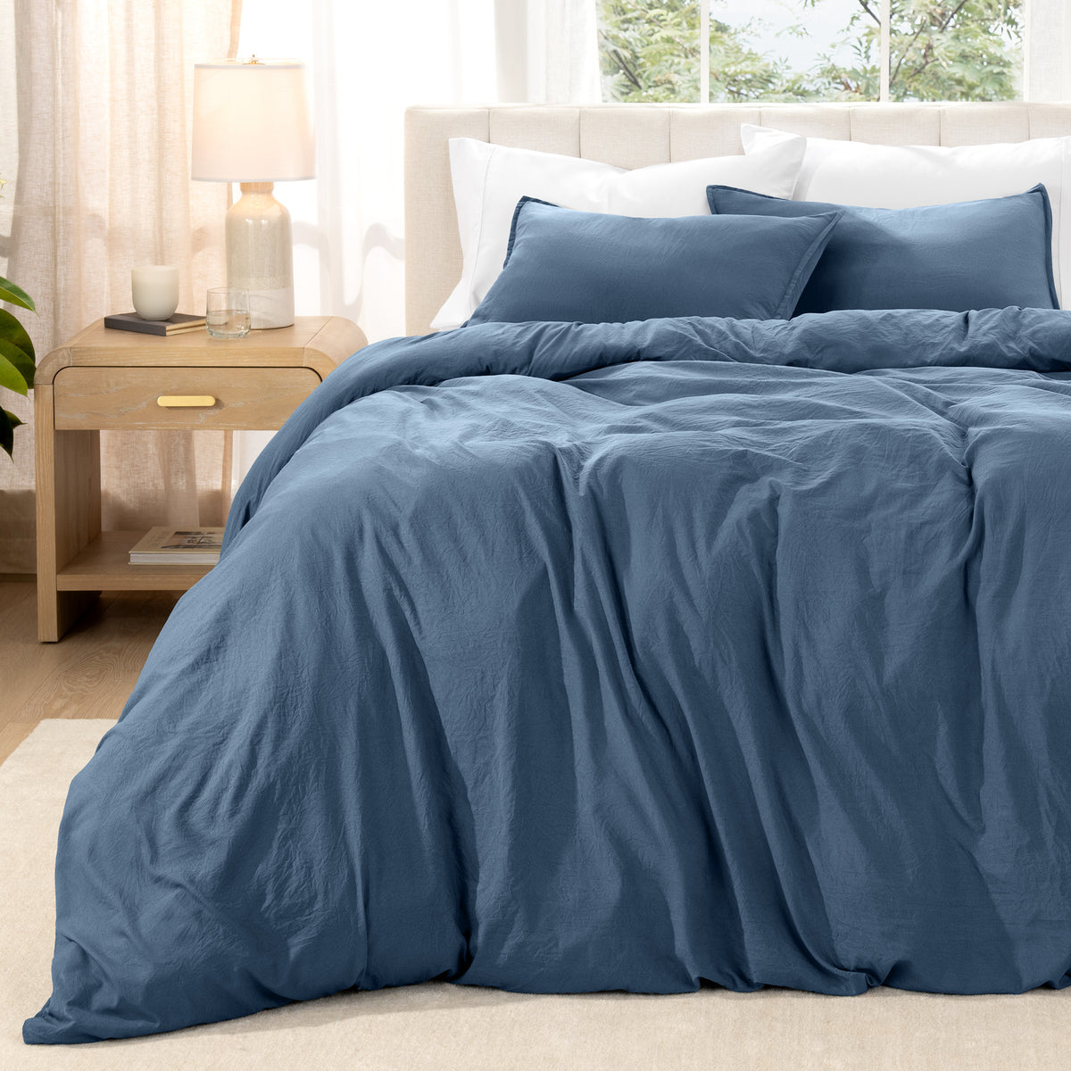 Close-up of a duvet cover with a zipper, featuring the brand Bare Home