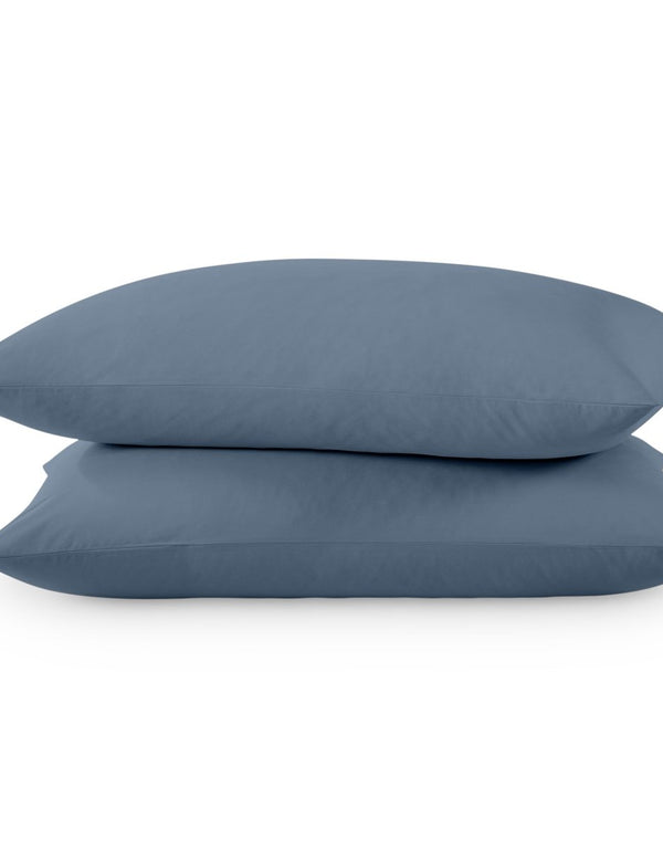 Two pillows with percale pillowcases on them