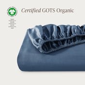 Certified GOTS Organic fitted sheet on a light gray background