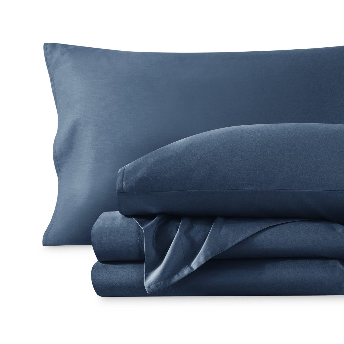 A sateen sheet set folded and stacked on a white background.