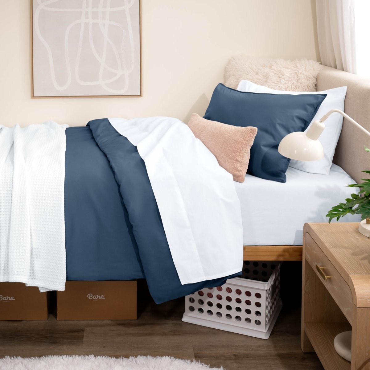Bed with percale bedding in a dorm room setting