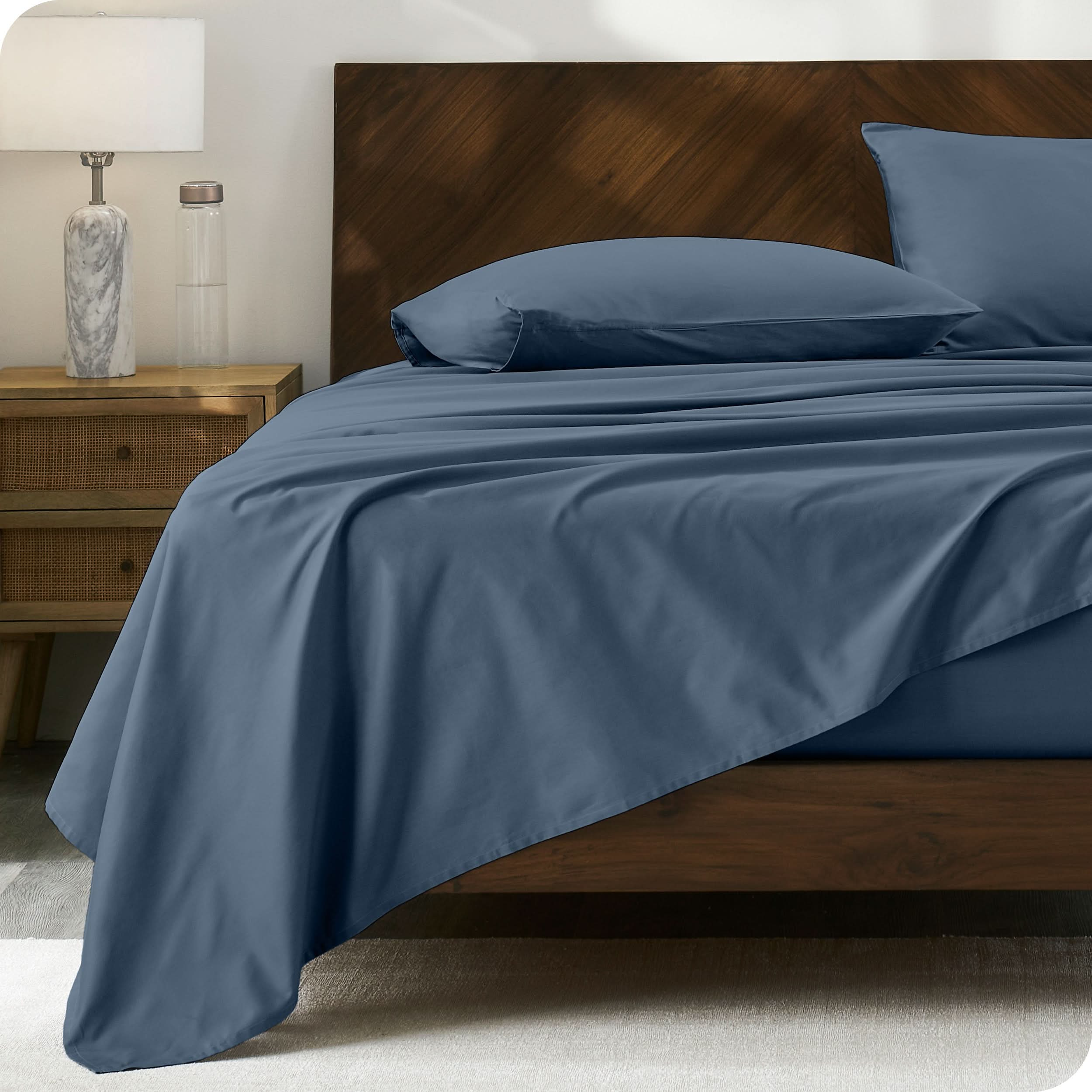 Modern wood bed made with percale sheet set