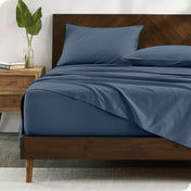 Modern wood bed made with percale sheet set