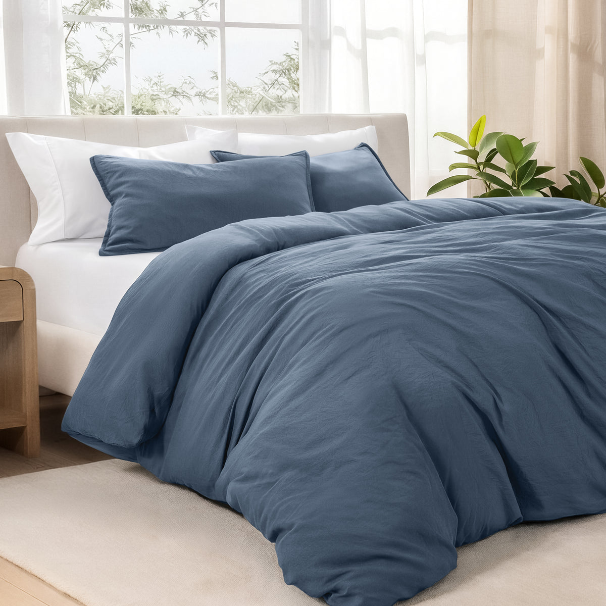 Bedding set on a bed in a bright room with natural light