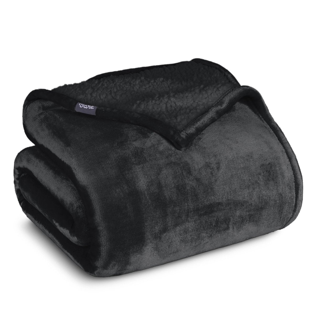 A sherpa blanket folded neatly while showing both sides