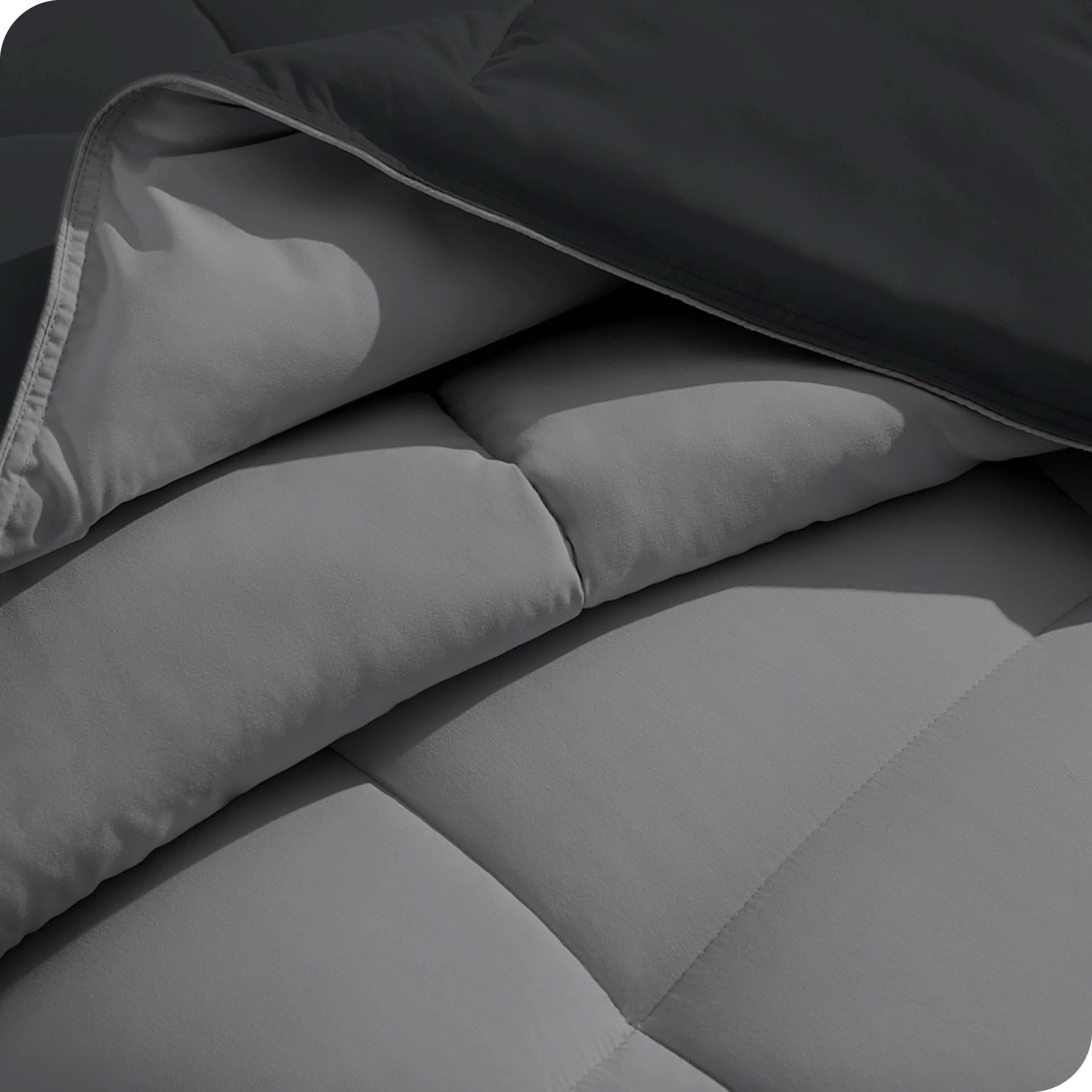 Close up of the comforter folded back showing the two different colored sides