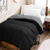 College dorm room with a reversible comforter on the bed