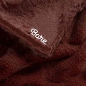 Faux fur blanket with Bare logo