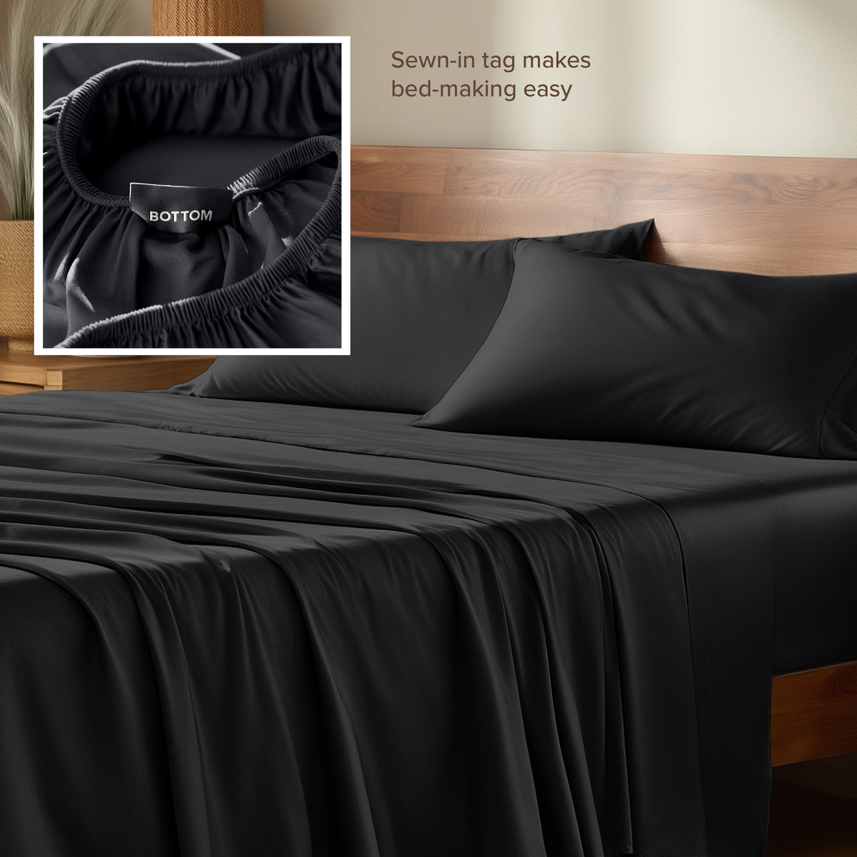 Bamboo sheets with a sewn-in tag on a wooden bed frame.