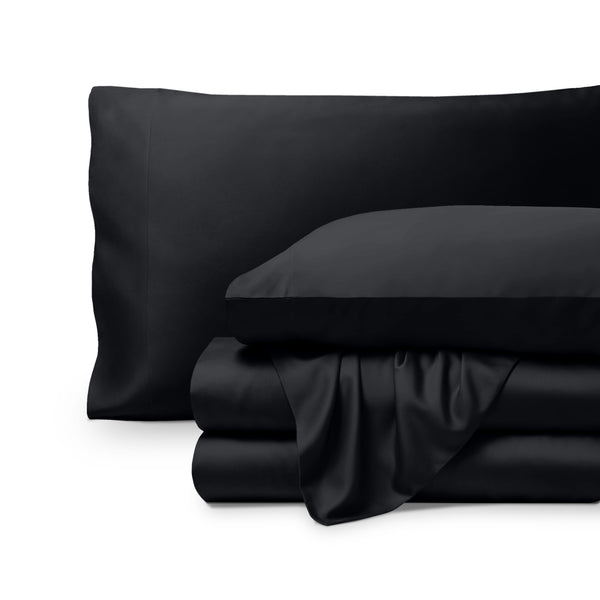 Bamboo pillowcases and sheets set on a white background
