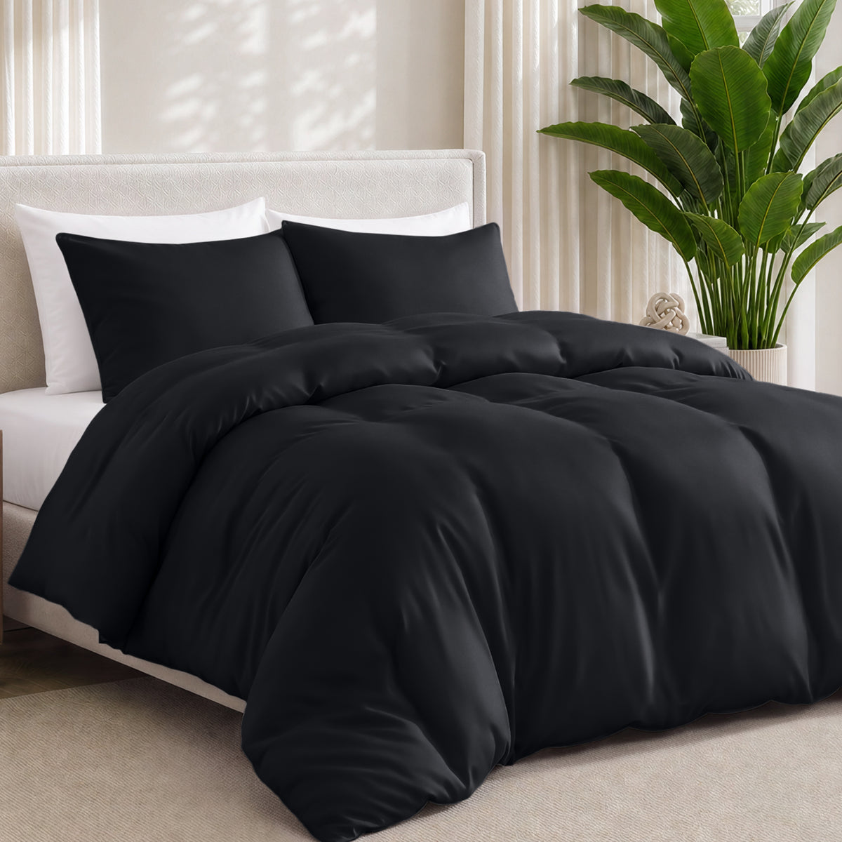 Bamboo bedding set on a bed in a bedroom with a plant in the corner.