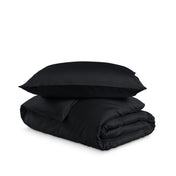 Bedding set with duvet cover and pillow shams on a white background